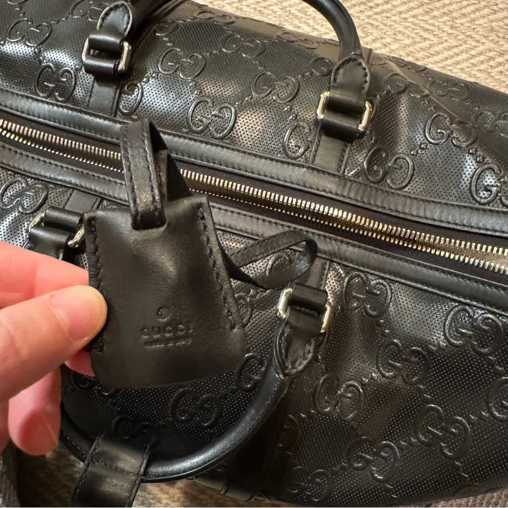 New! Gucci GG embossed black leather duffel bag